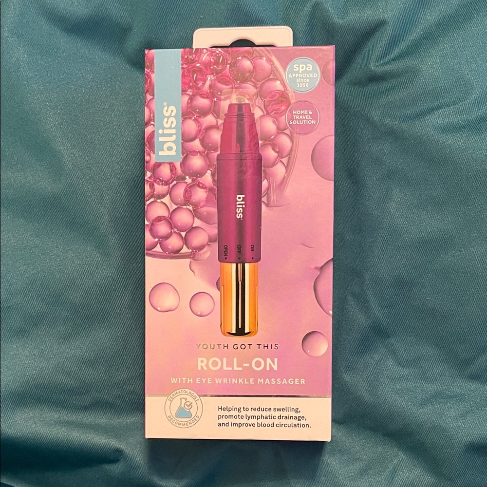 Bliss Roll-On Eye Massager - Purple and Gold
